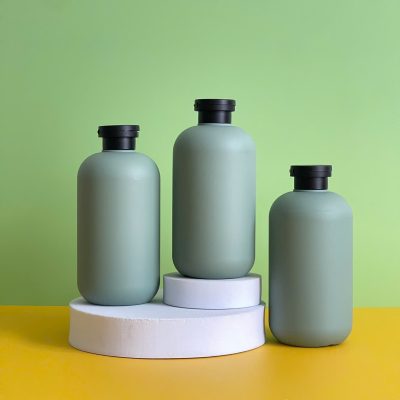 Chai nhựa HDPE xanh đậm tròn nắp bật đen nhám với dung tích 500ml sử dụng nắp fi28