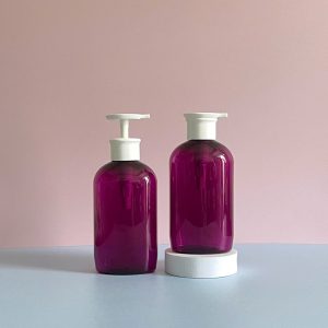 Chai nhựa PET tím trong tròn 500ml vòi nhấn dẹp trắng sử dụng nắp fi28 chuyên dụng